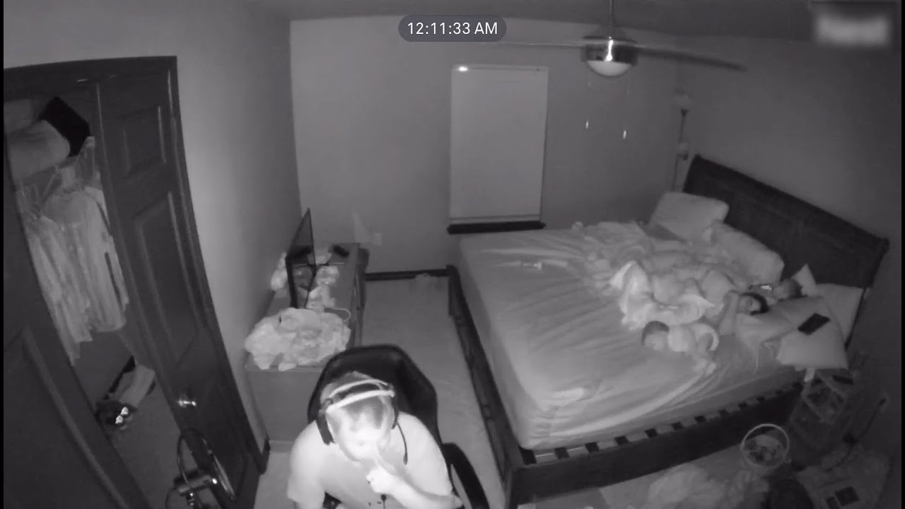 Dad Catches Baby Falling Out of Bed - 1340762