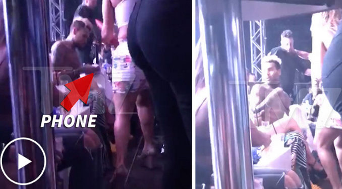 Excédé d’avoir été pris en photo, Chris Brown s’empare du téléphone et le jette dans la boîte de nuit !